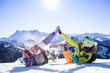 © Nikola Spasenoski - two girls with ski and snowboard having fun on snow