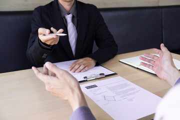 Job seeker presentation about himself with interview employee for job interview in the office