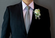 © SMPTY - groom dressing neat suit with bouquet of flowers on his chest
