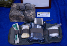 Backpack With Soldier’s First Aid Kit: Bandages, Wound-healing Drugs, Balloon With Burn-treating Gel, Painkillers