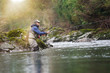 trout fly fisherman in river