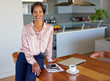 © marvent - Confident young businesswoman  leaning on her dining room table at home
