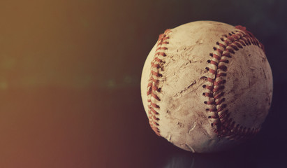 Wall Mural - Old baseball sport background with copy space by leather game ball, rough vintage texture.