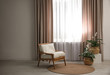 © New Africa - Comfortable armchair near window with elegant curtains in room