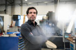 © Westend61 - Portrait of a pensive businessman in a factory