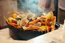 Seafood Boil In A Steamy Pot For A Festive And Delicious Party