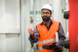 © Cavan Images - heating engineer checking system