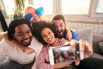 Poster - Male and female having fun with cell phone.