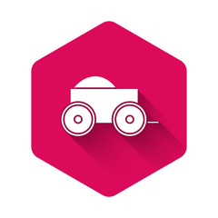 Poster - White Wooden four-wheel cart with hay icon isolated with long shadow. Pink hexagon button. Vector Illustration