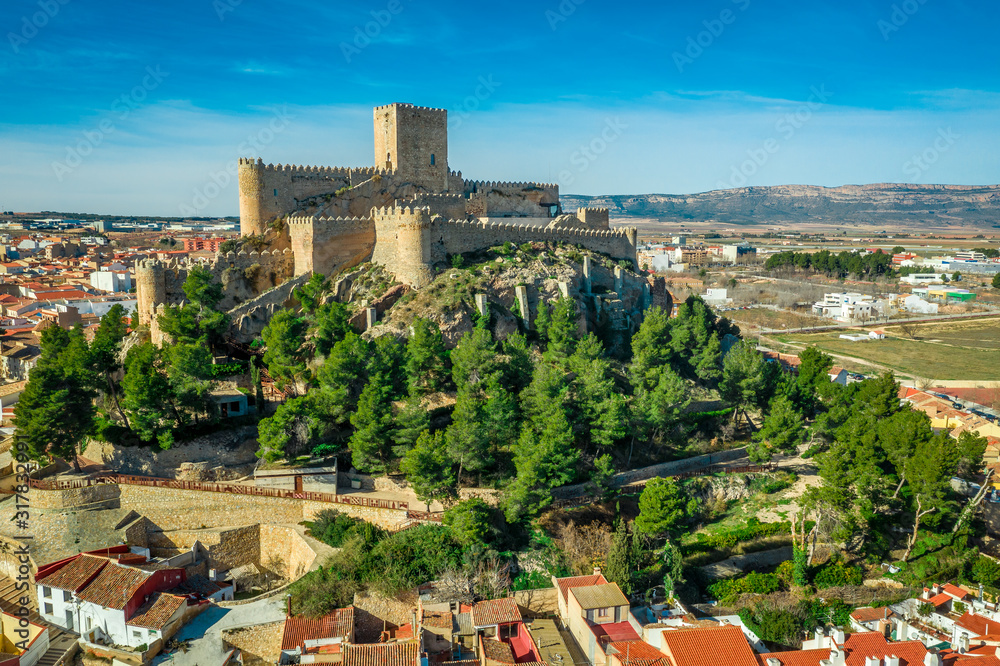 Aerial view of medieval Almansa castle with donjon and courtyard on a ...