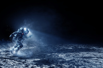 Wall Mural - Spaceman running fast. Mixed media