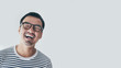 © panitan - portrait young asian man wear eye glasses Smiling cheerful look thinking position with perfect clean skin posing on white background.fashion people freedom life style concept