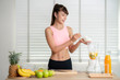 © anekoho - Asian girl prepare material for make a smoothie juice