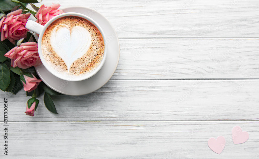 A cup of coffee with heart pattern - obrazy, fototapety, plakaty 