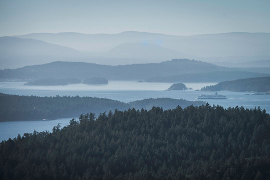 misty morning view in between islands from pender island gulf islands vancouver british columbia can