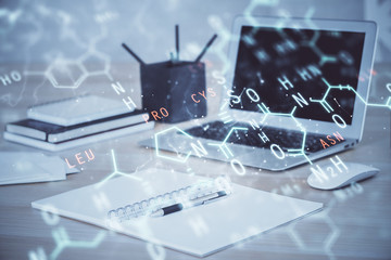 Desktop computer background and formula hologram writing. Double exposure. Education concept.