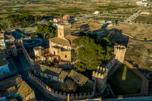 Aerial Morning View Of Fully Restored Besano Castle In Valencia With Battlements, Towers And A Keep In Spain