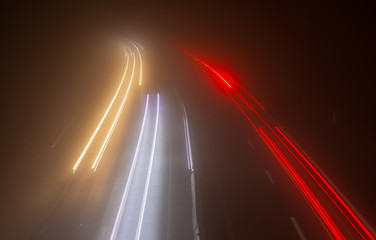 Road. Foggy. Night. Trafic. Lights. Red. Color