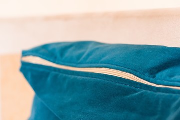 Poster - Closeup shot of a blue pillow with white zipper