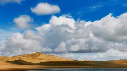 Wall Mural - Clouds movig over Barkhans in Mongolia sandy dune desert Mongol Els. Khovd province, Western Mongolia.