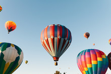 Low Angle View Of Hot Air Balloons Against Clear Sky