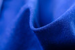 Leinwandbild Motiv blue fabric material cloth macro blur background