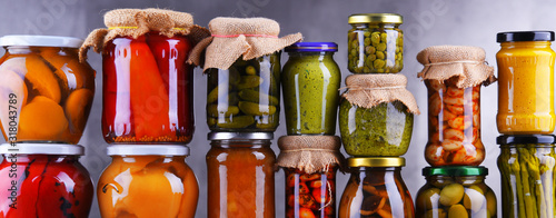 Jars with variety of pickled vegetables and fruits Tableau sur Toile