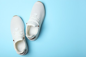 Wall Mural - men's sneakers on a colored background. men's footwear. minimalism