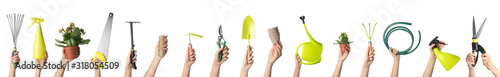 Fotomural Female hands with different gardening supplies on white background