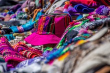 Selective Focus Shot Of Handcrafted Hats And Scarves In A Market