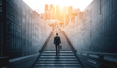 Wall Mural - Ambitious business man climbing stairs to meet incoming challenge and business opportunity. The high stair represents the concept of career path success, future planning and business competitions.