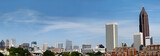 Fototapeta Miasto - Downtown Atlanta Skyline showing several prominent buildings, apartments, offices and hotels under a blue sky.
