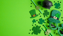 St Patricks Day Banner Design With Irish Elf Hats, Pot Of Gold, Shamrock Leaf Clovers, Glasses On Green Background. Happy St. Patrick's Day Concept. Greeting Card Template, Poster, Flyer Mockup