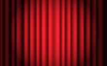 Luxury Scarlet Red Silk Velvet Curtains And Draperies Interior Decoration Design. Luxurious Indoor Red Curtain Illuminated Spotlight. Red Theatre Curtain