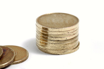 Close up shot of stacked golden coin isolated