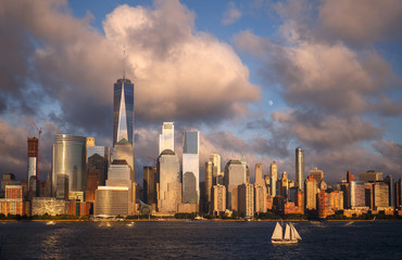 Fototapete - Lower Manhattan Skyline and moon rising at Golden Hour, NYC, USA