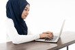 © vichie81 - Muslim girl using laptop