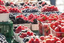 Raspberries, Strawberries And Blackberries,  Fresh And Red, For Sale On A Market In Brno, Czechia. Piled On A Stall. These Are Among The Most Traditional Fruits Of Central Europe In Summer