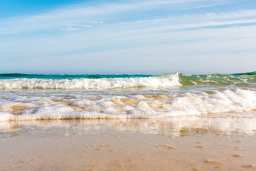 Sticker - Bursts of sea waves on a tropical sea beach,