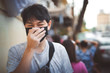 © tickcharoen04 - asian man wear the breathing mask for protect colonavirus and health care from exhaust gases