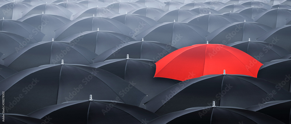 Different and standing out of the crowd umbrella. Concept of leader. - obrazy, fototapety, plakaty 