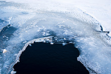 Full Frame Shot Of Cracked Ice On Frozen Lake