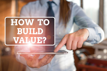 Poster - Handwriting text How To Build Value question. Conceptual photo Ways for developing growing building a business Blurred woman in the background pointing with finger in empty space