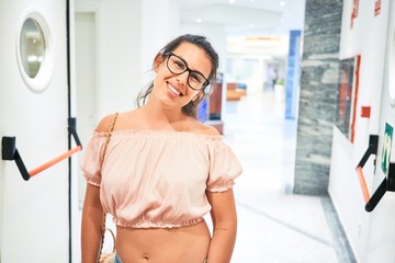 Poster - Beautiful girl smiling happy inside of hotel hall