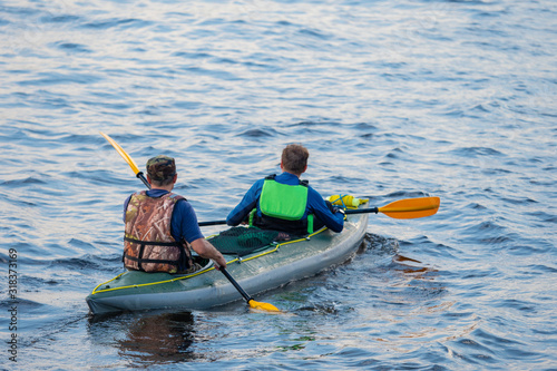 Cuadros en Lienzo Travel on the lake by kayak
