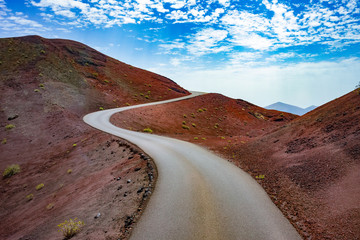 Wall Mural - image related to unexplored road journeys and adventures.road through the scenic landscape to the de