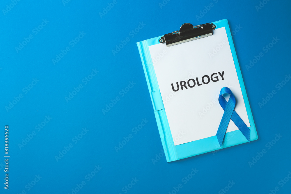 Blue ribbon with clipboard on color background. Prostate cancer concept
