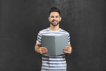 Sticker - Male student near blackboard in classroom