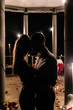 © Александр Бутылов - Silhouette of a young kissing couple, boyfriend and girl in a romantic setting