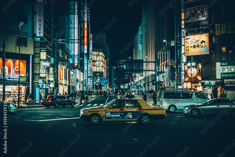VIEW OF CITY STREET AT NIGHT - obrazy, fototapety, plakaty 